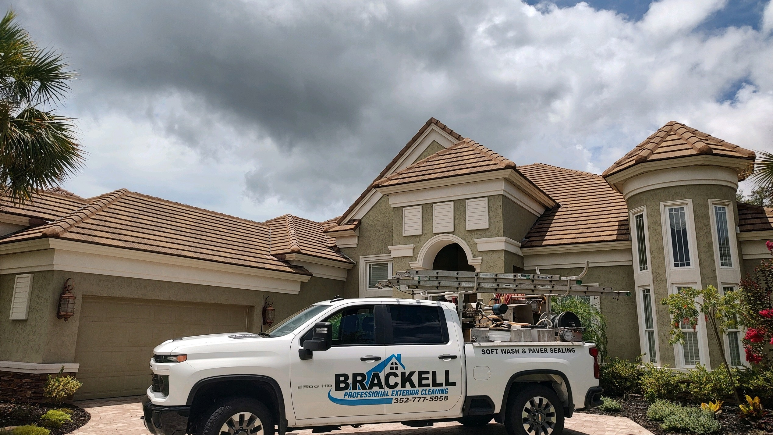 Brackell Pressure Washing 3 Brackell Pressure Washing truck at residential home in Citrus County Florida after roof cleaning and exterior washing service